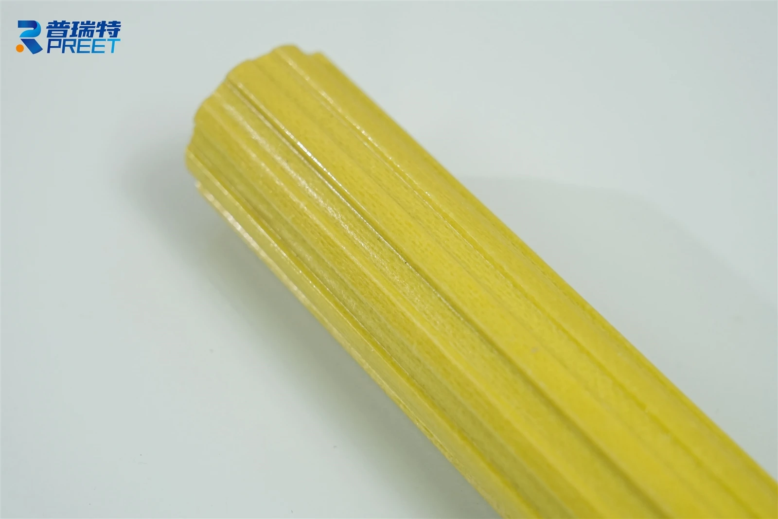 Pultruded fiberglass FRP toothed tube with a textured grooved surface for industrial composite applications Pultruded fiberglass FRP toothed tube with a textured grooved surface for industrial composite applications